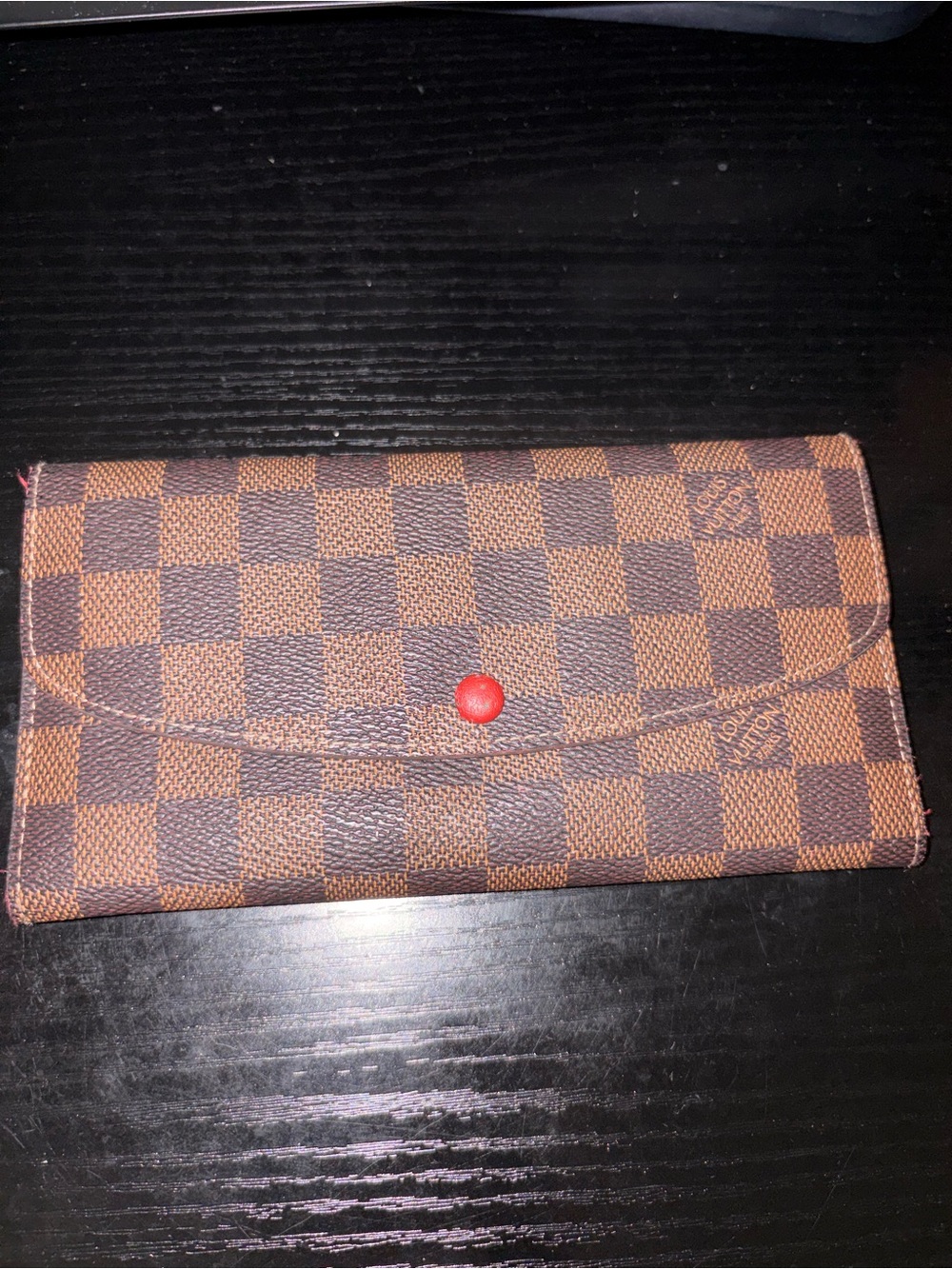Brown Checkered Continental Wallet with Red Snap Closure